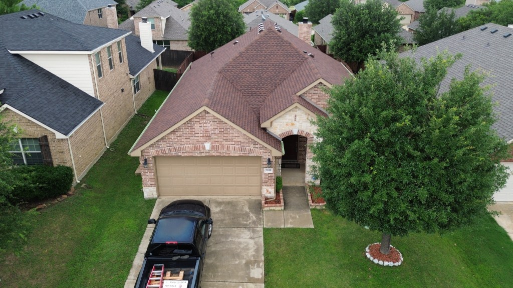 Aerial view of a residential roofing project in North Texas