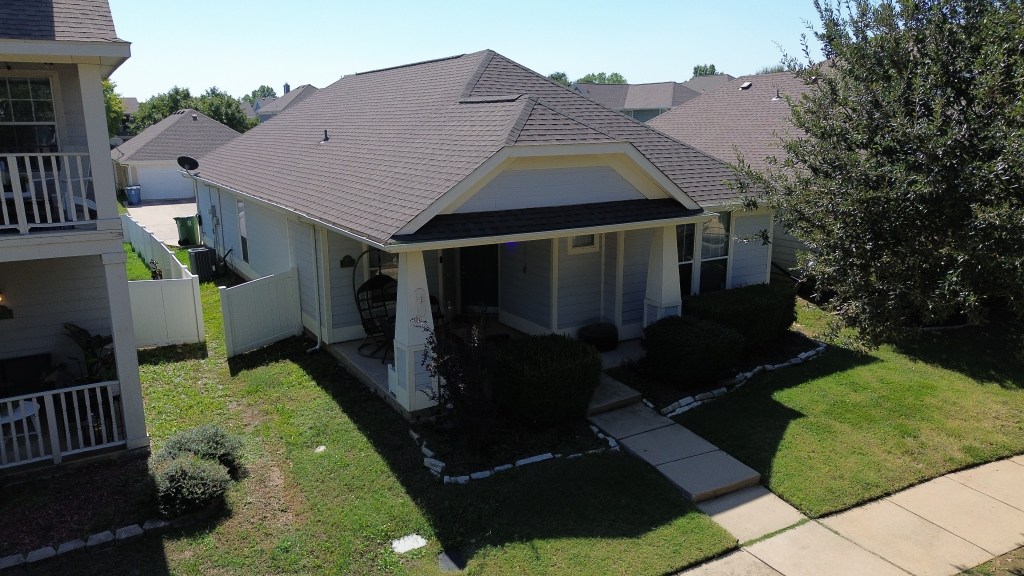 Front aerial view of a completed residential roof